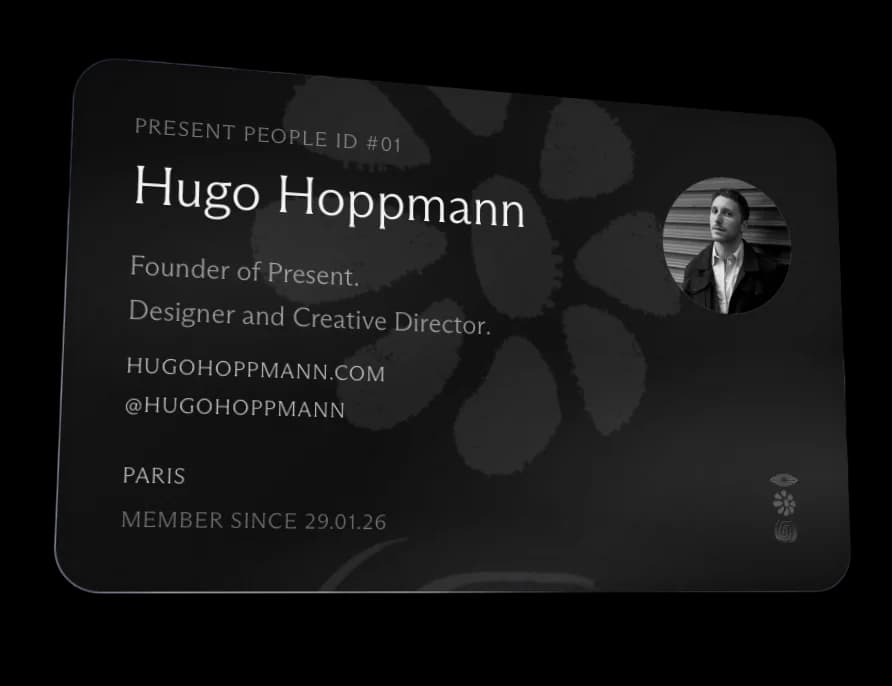 A Present People Membercard: member number, name, craft, links and city, on black